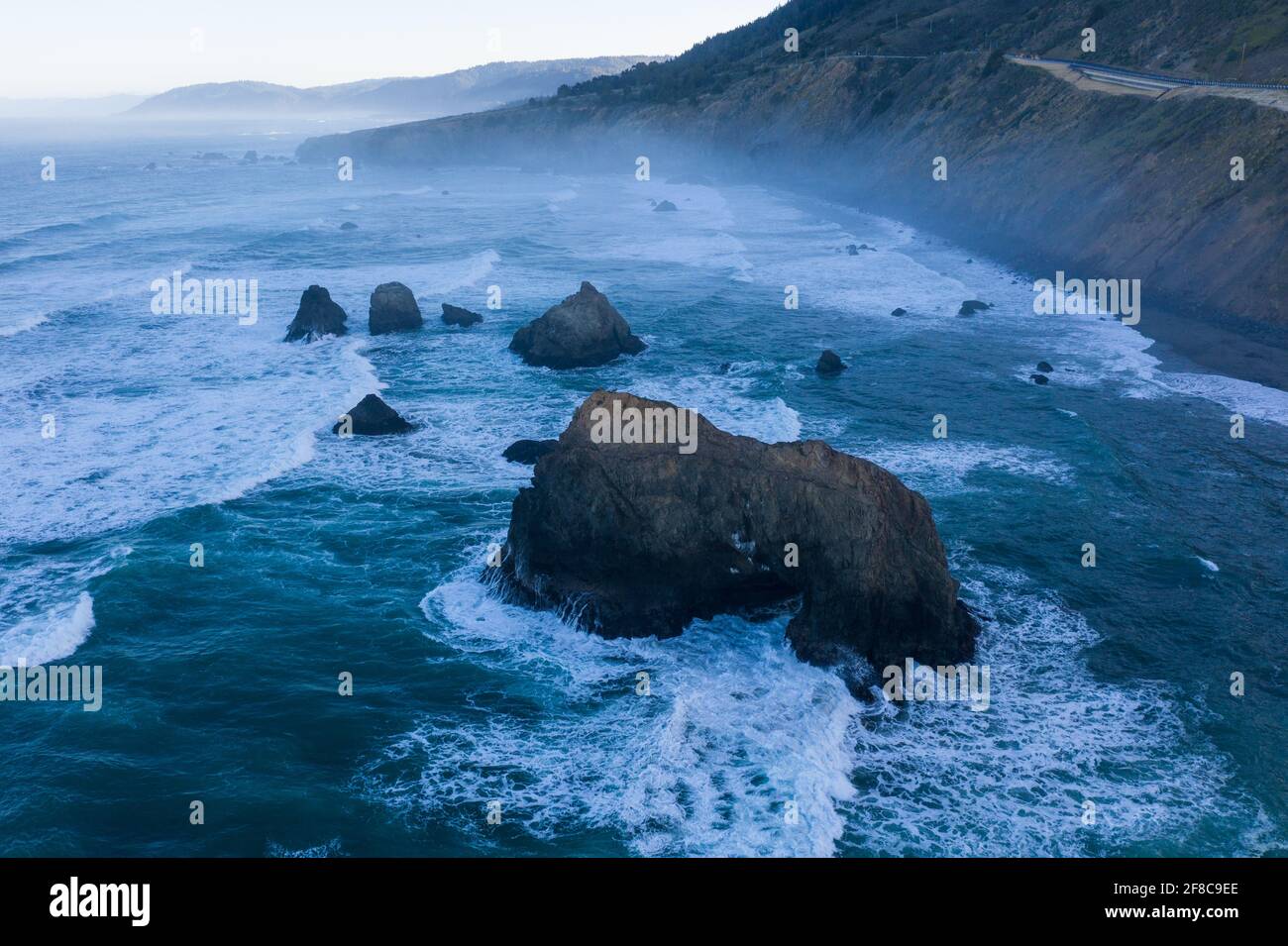 The Pacific Ocean meets the rocky shore of Northern California in Mendocino. This scenic region is known for its beautiful, rugged coastlines. Stock Photo