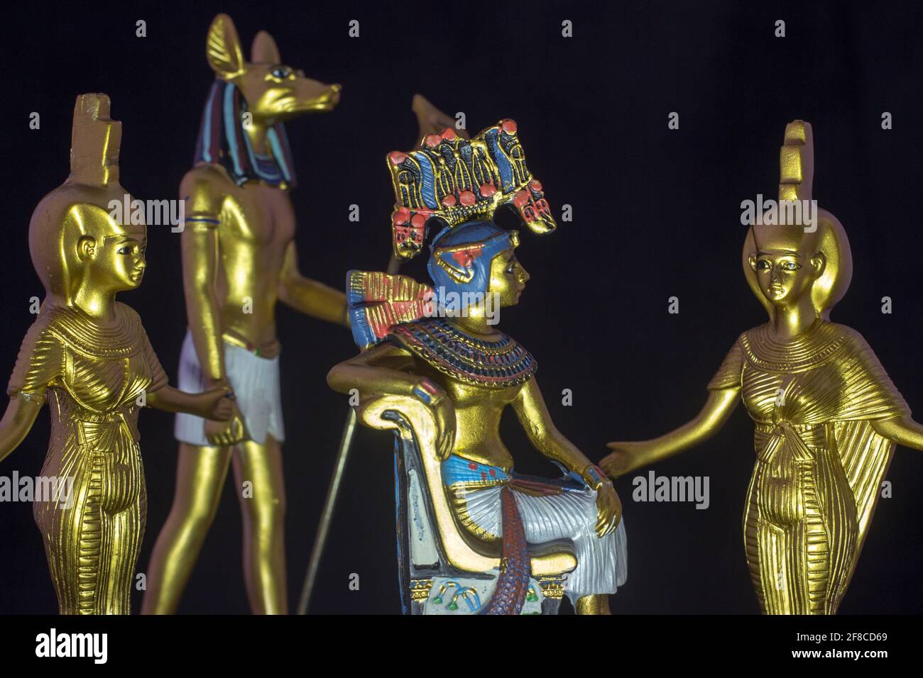 Still life with egyptian figures of anubis, pharaoh and the goddess nebtht and eset Stock Photo
