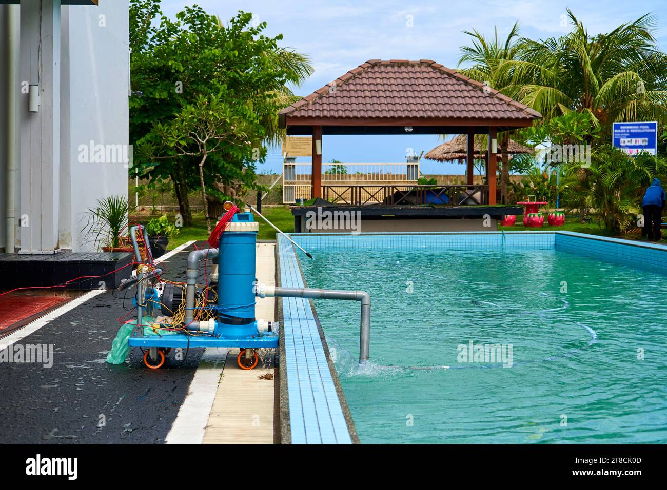 A filter pump cleans the pool water. Device for automatic cleaning of