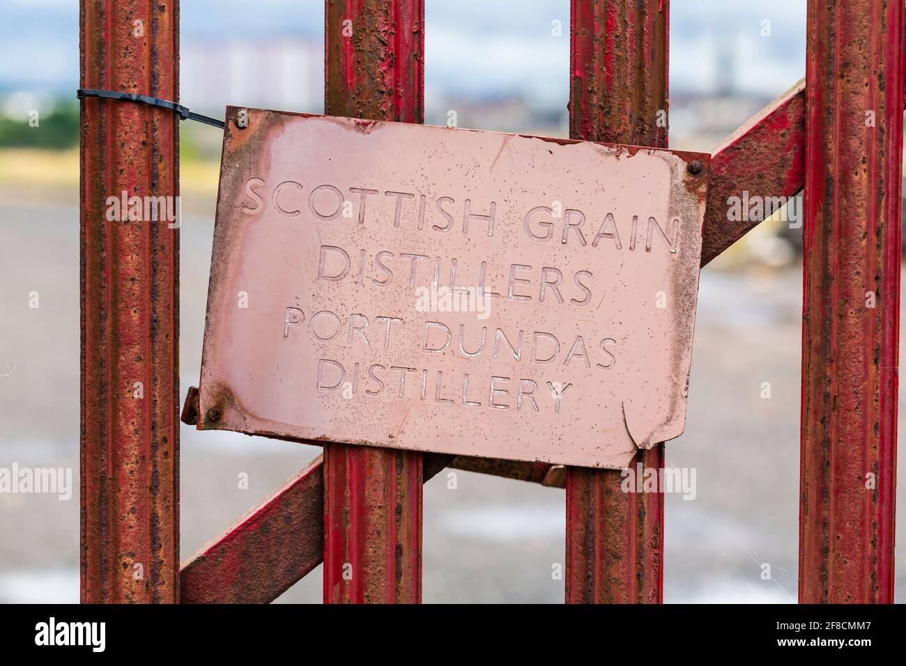 The Port Dundas Distillery is permanently closed. Scottish Grain Distillers faded sign, Port Dundas Distillery, Glasgow, Scotland, UK Stock Photo