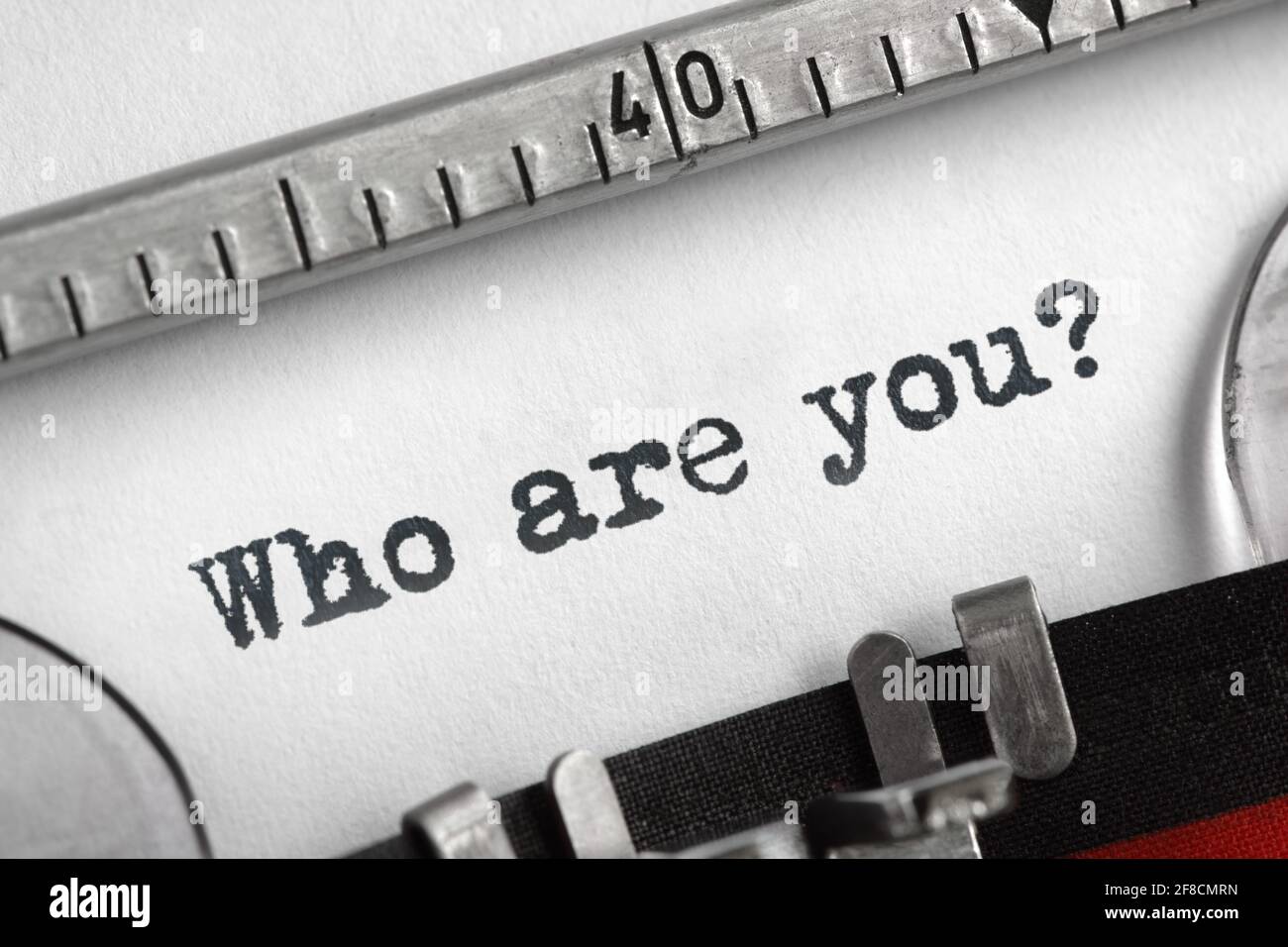Who are you typed on an old typewriter concept for self belief, positive attitude and  identity Stock Photo