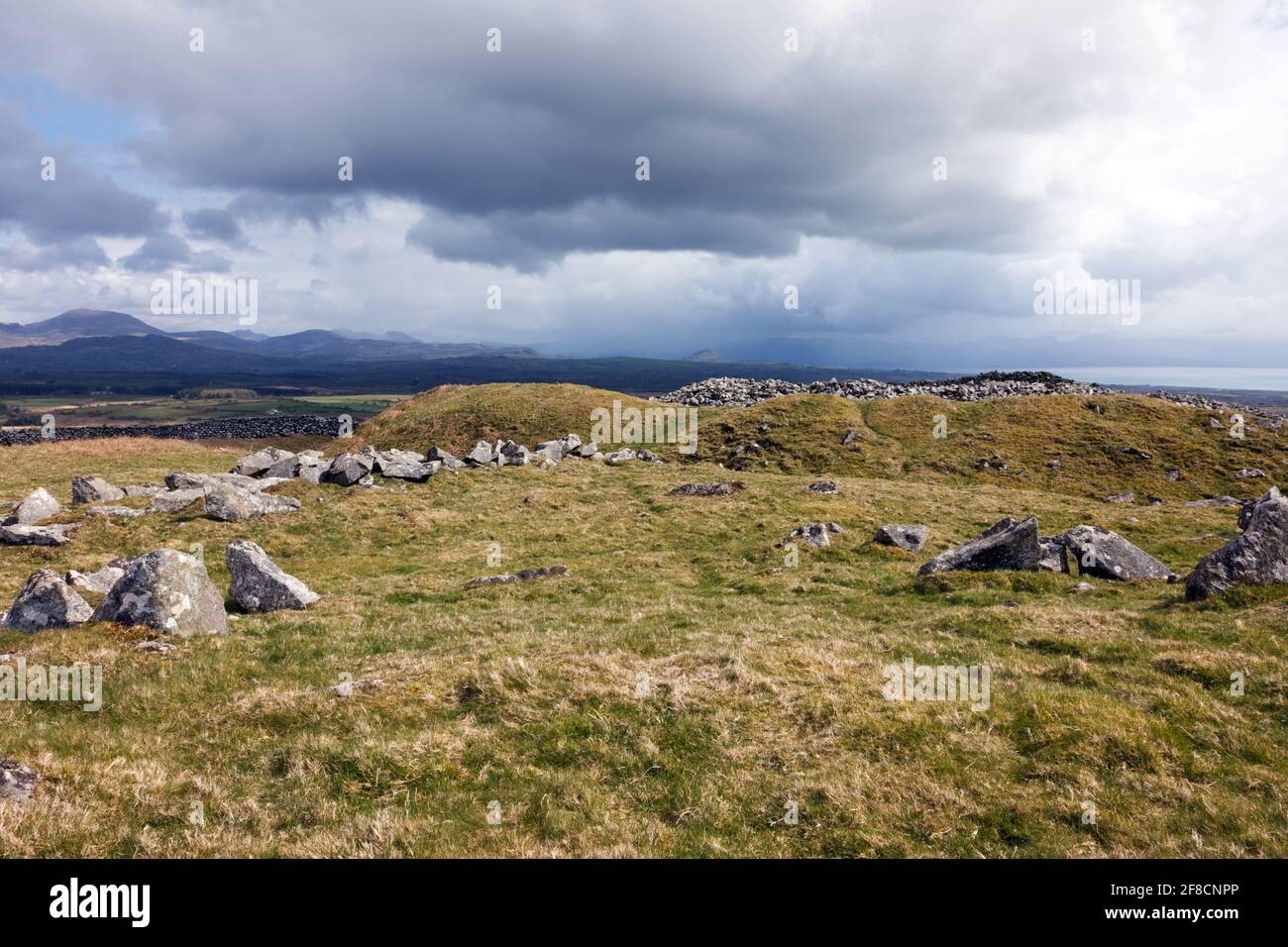 Carn Pentyrch Hillfort is an Iron Age, concentric stone-walled enclosure complex near Llangybi on the Lleyn Peninsula in North Wales. Stock Photo