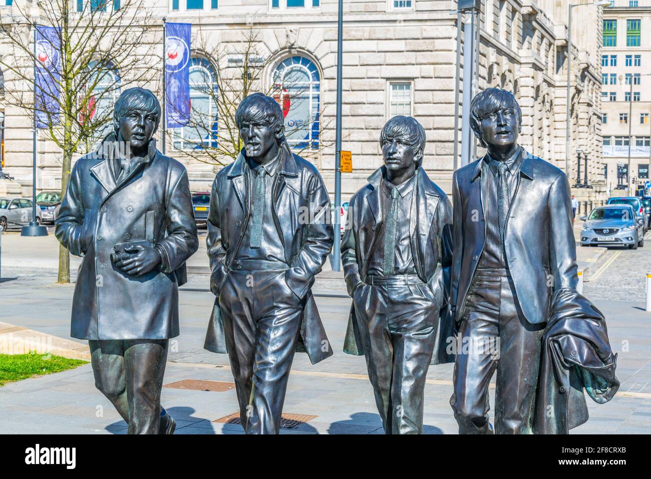 Statue of the Beatles in front of the royal liver building in Liverpool, England Stock Photo