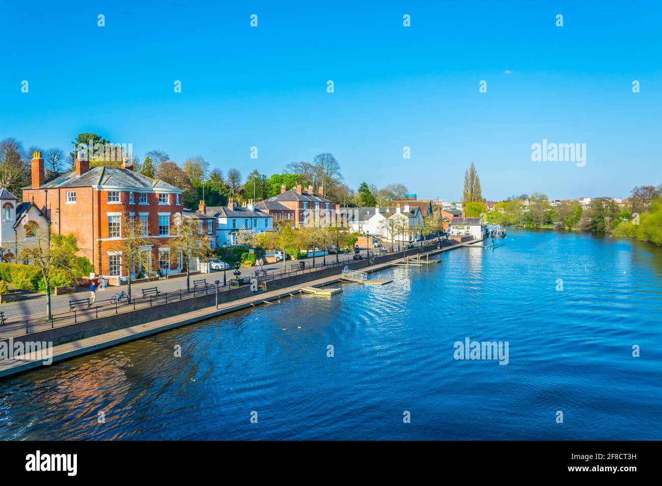 View of residential houses alongside river Dee in Chester, England ...