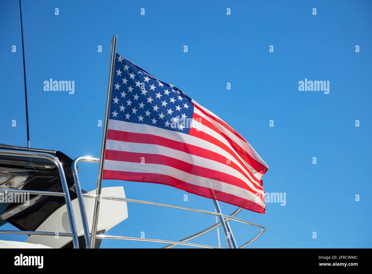 United States Of America Flag Waving On Yacht Stern. Luxury Boat Moored At  Marina In Athens Greece. Blue Sky Background, Close Up View Stock Photo -  Alamy