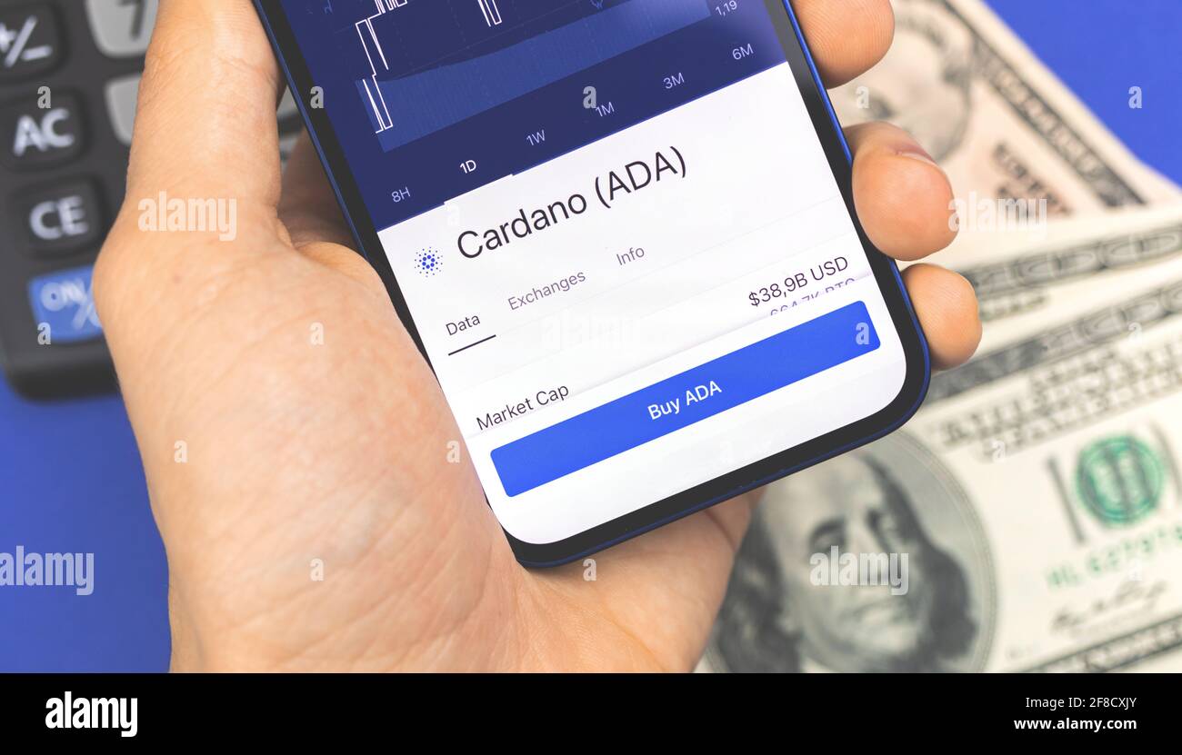 Man is using smartphone for buying Cardano ADA crypto currency, mobile  trade and stock exchanges concept background Stock Photo - Alamy