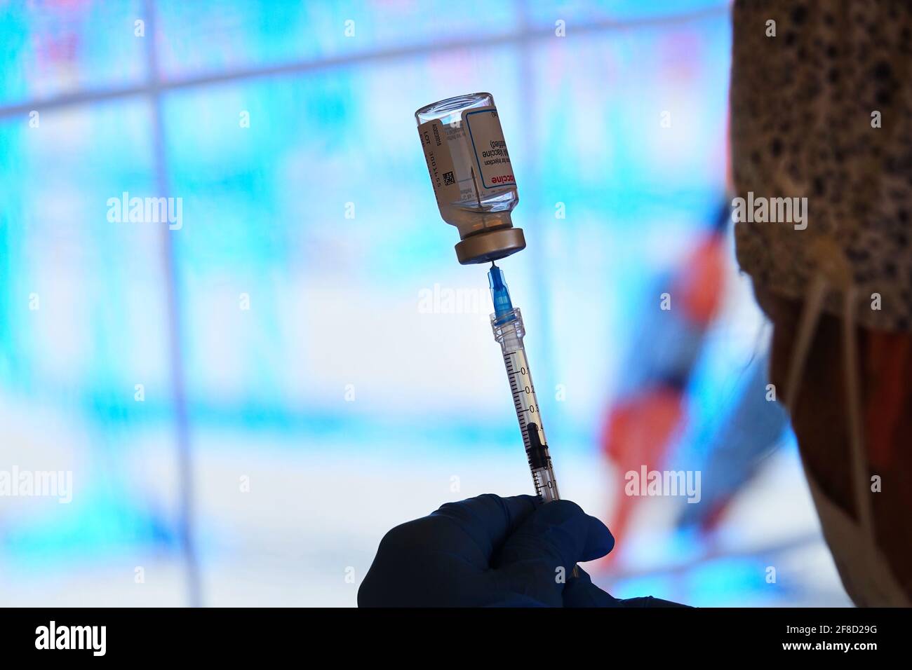 Close up of a vial of Moderna Covid-19 vaccine used in an Italian vaccination centre. Turin, Italy - April 2021 Stock Photo