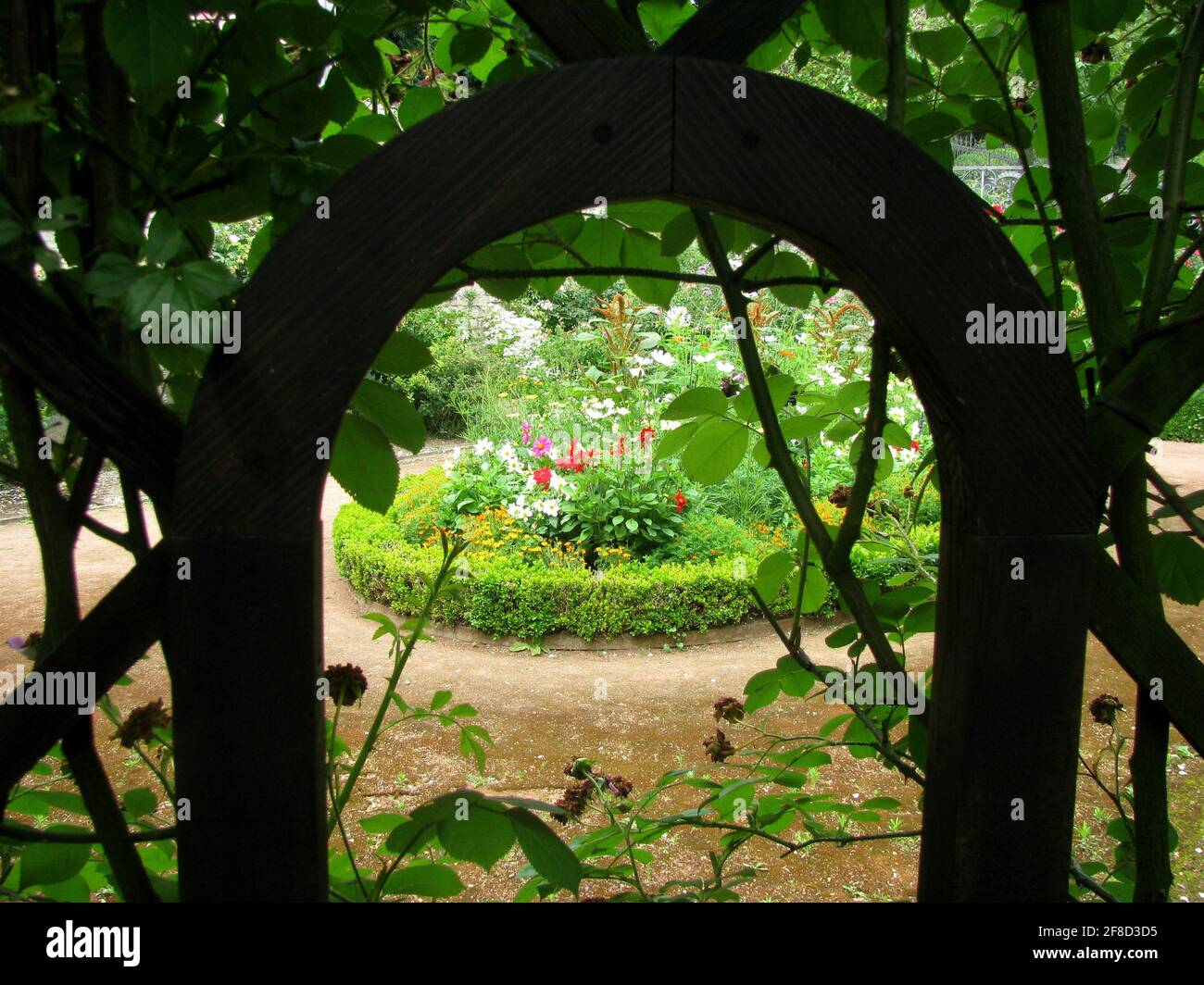 view through a wooden arch into the garden of the Dornburger Schlösser, Germany Stock Photo