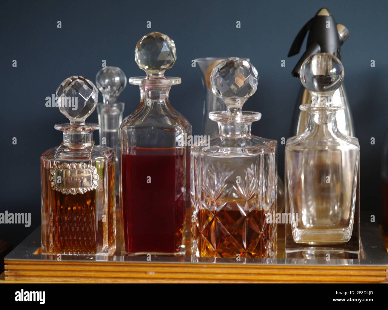 Decanter tray and glass decanters spirits and siphon Stock Photo