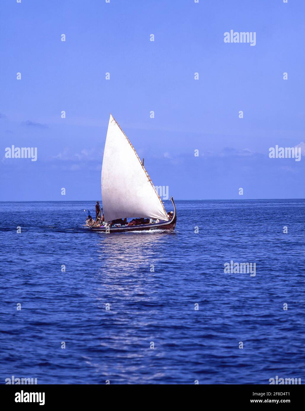 Wooden dhow boat with sail, Bandos, Kaafu Atoll, Republic of Maldives Stock Photo