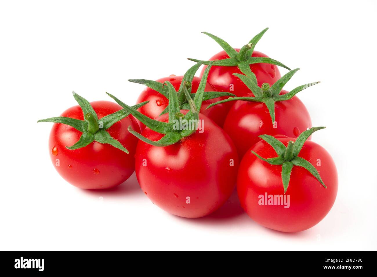 Ripe red cherry tomatoes isolated on white Stock Photo