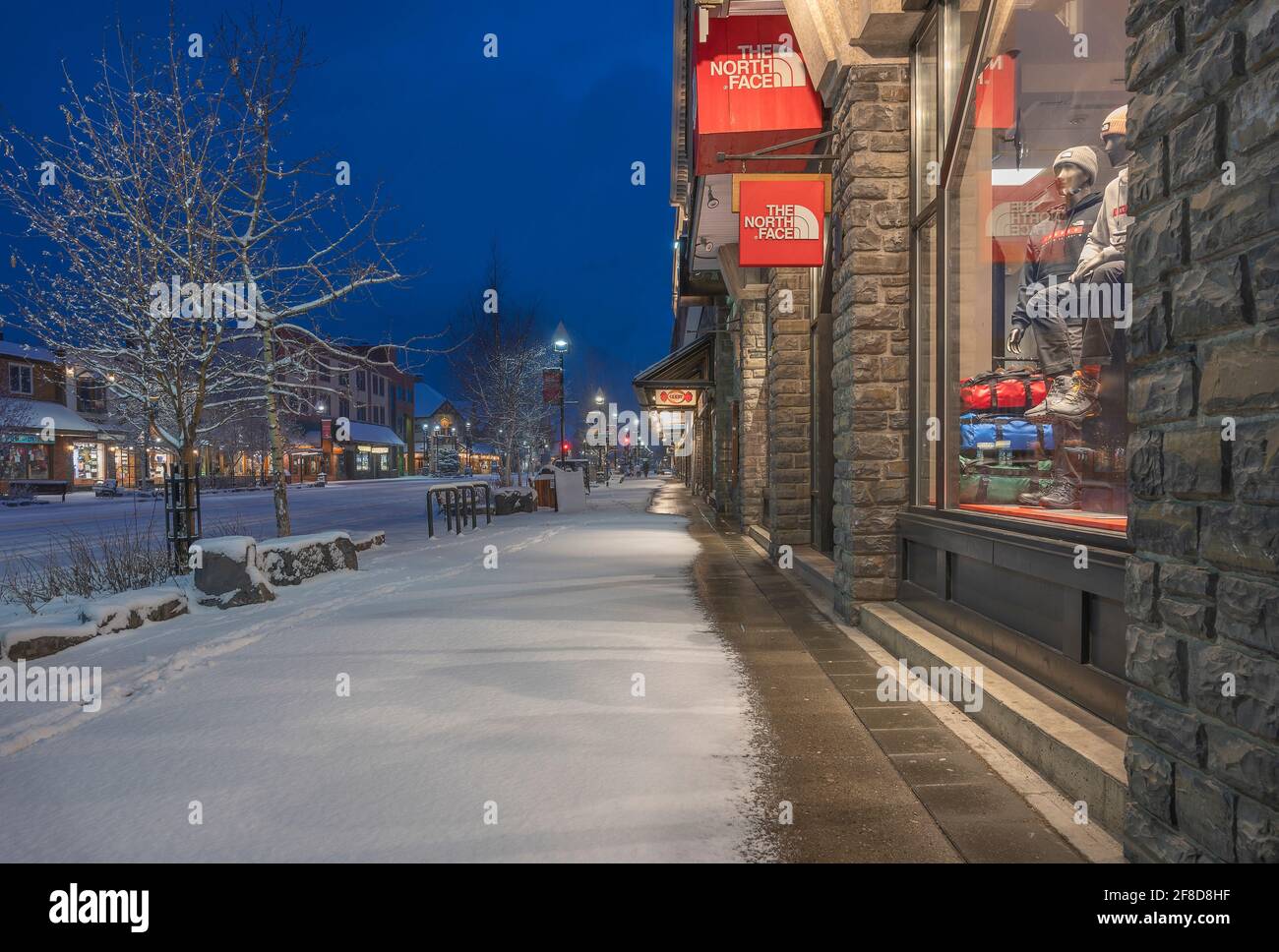 Banff, Alberta, Canada – April 10, 2021:  Banff Avenue with shop display window in early morning Stock Photo