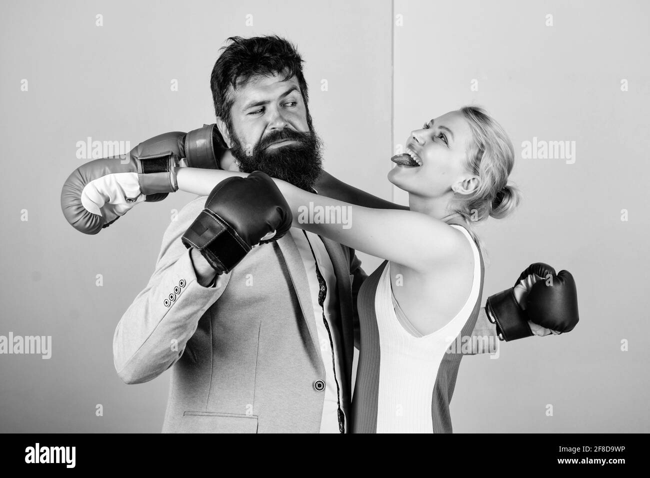 Family life. Boxers fighting gloves. Difficult relationships. Couple in love  competing boxing. Conflict concept. Man and woman boxing fight Stock Photo  - Alamy