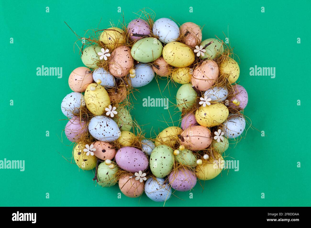Painted motley easter eggs arranged in a circle. Stock Photo