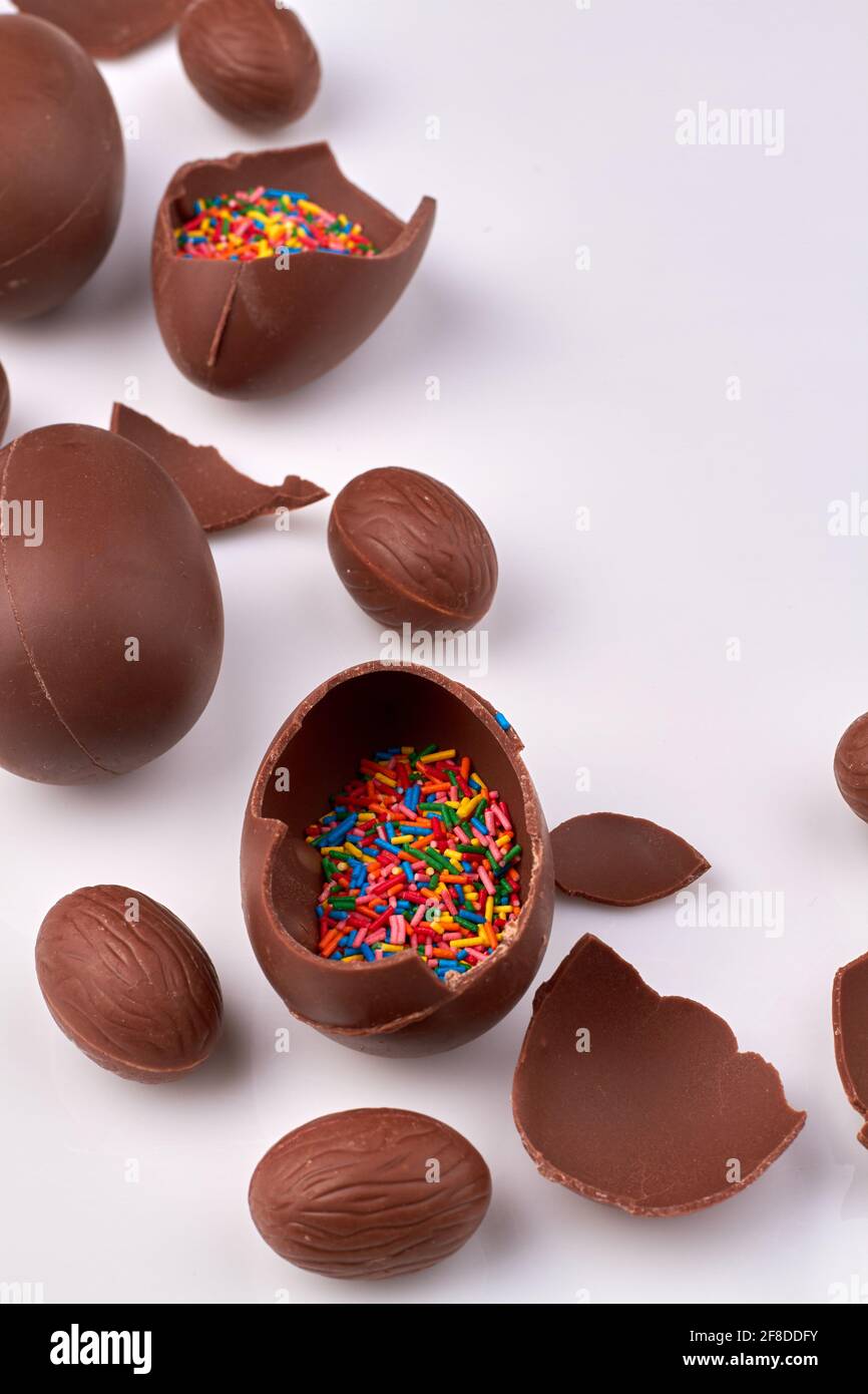 Sweet chocolate eggs with sprinkles. Stock Photo