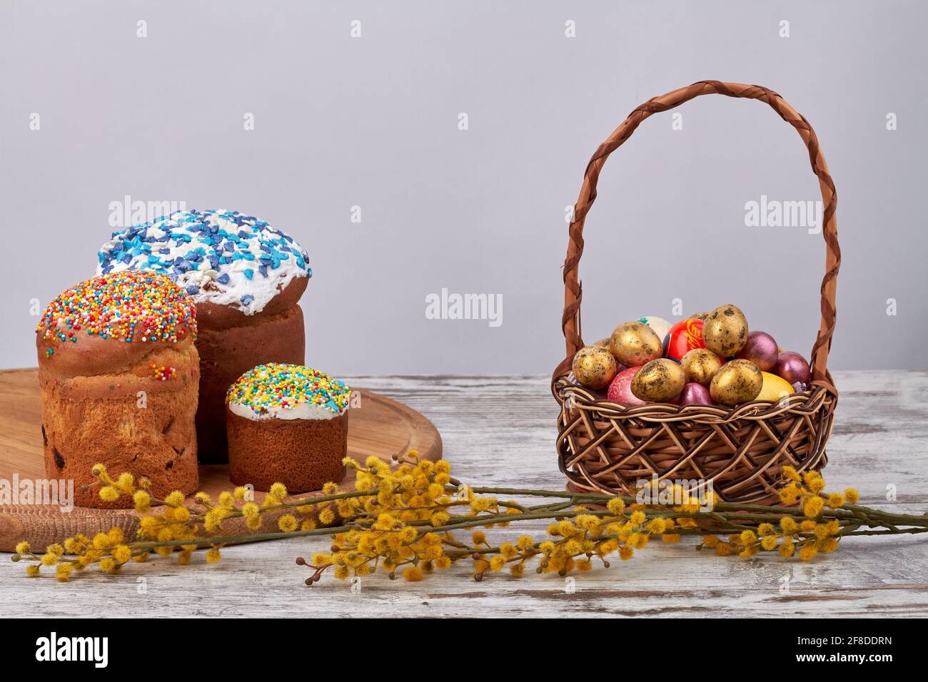 Sweet easter cakes with eggs and willow. Stock Photo