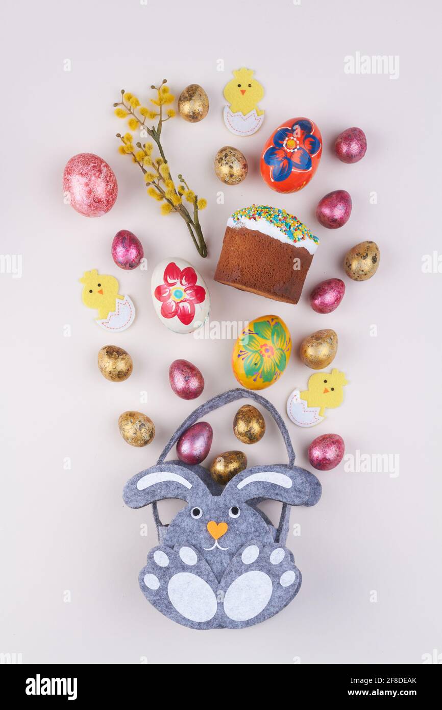 Flat lay easter symbols on white background Stock Photo - Alamy