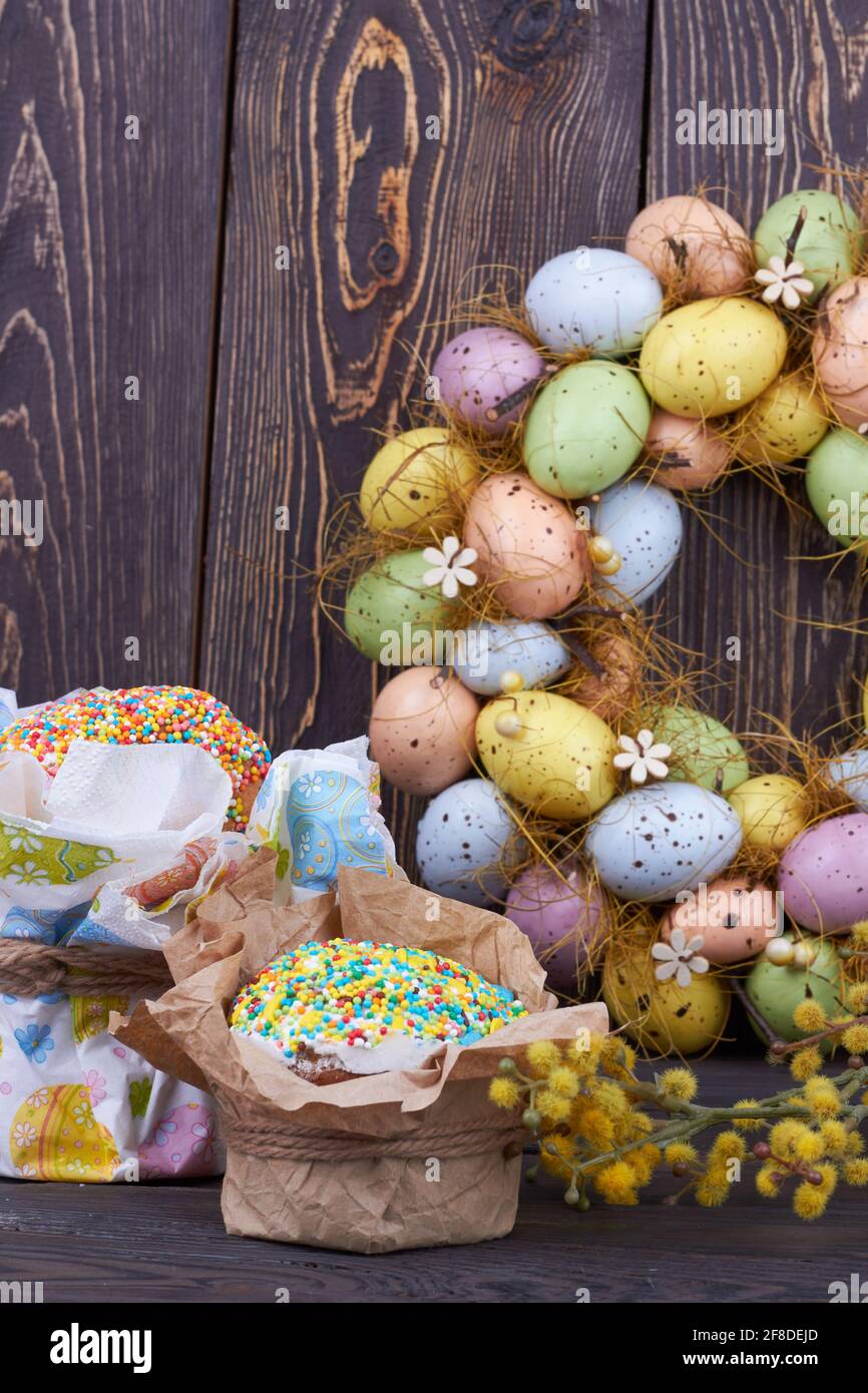 Colorful eggs with cakes and willow. Stock Photo