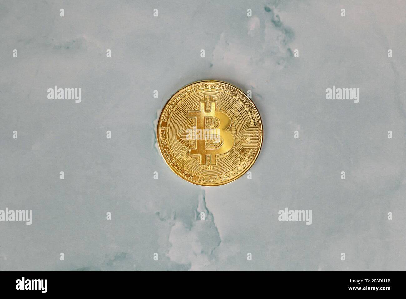 Golden Bitcoins Cryptocurrency top view stack of Digital coins on gray marble desk table background.Flat lay blank text.Copy space for word. Stock Photo