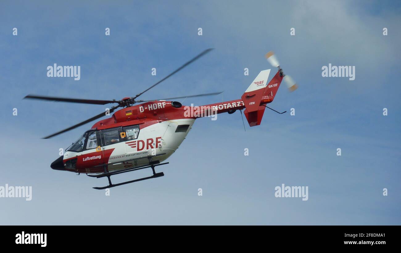 SANGERHAUSEN, GERMANY - May 16, 2010: Rescue helicopter approaching the landing platform at the hospital Stock Photo