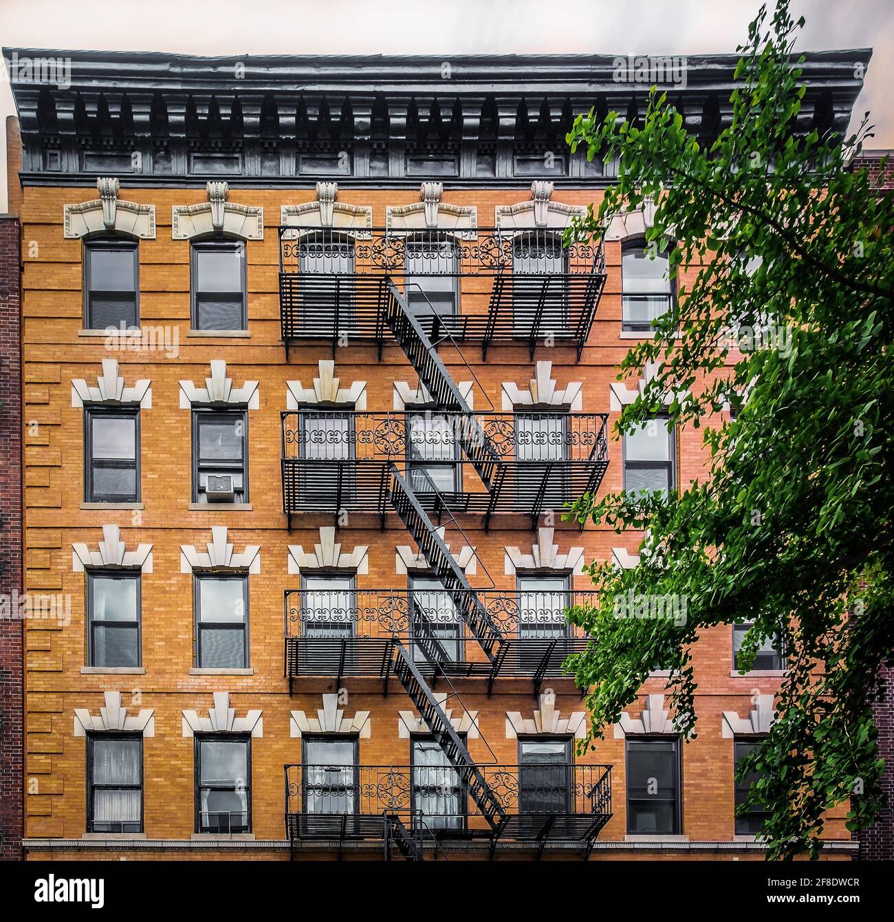 New York City, USA, May 2019, view of an orange brick building with ...