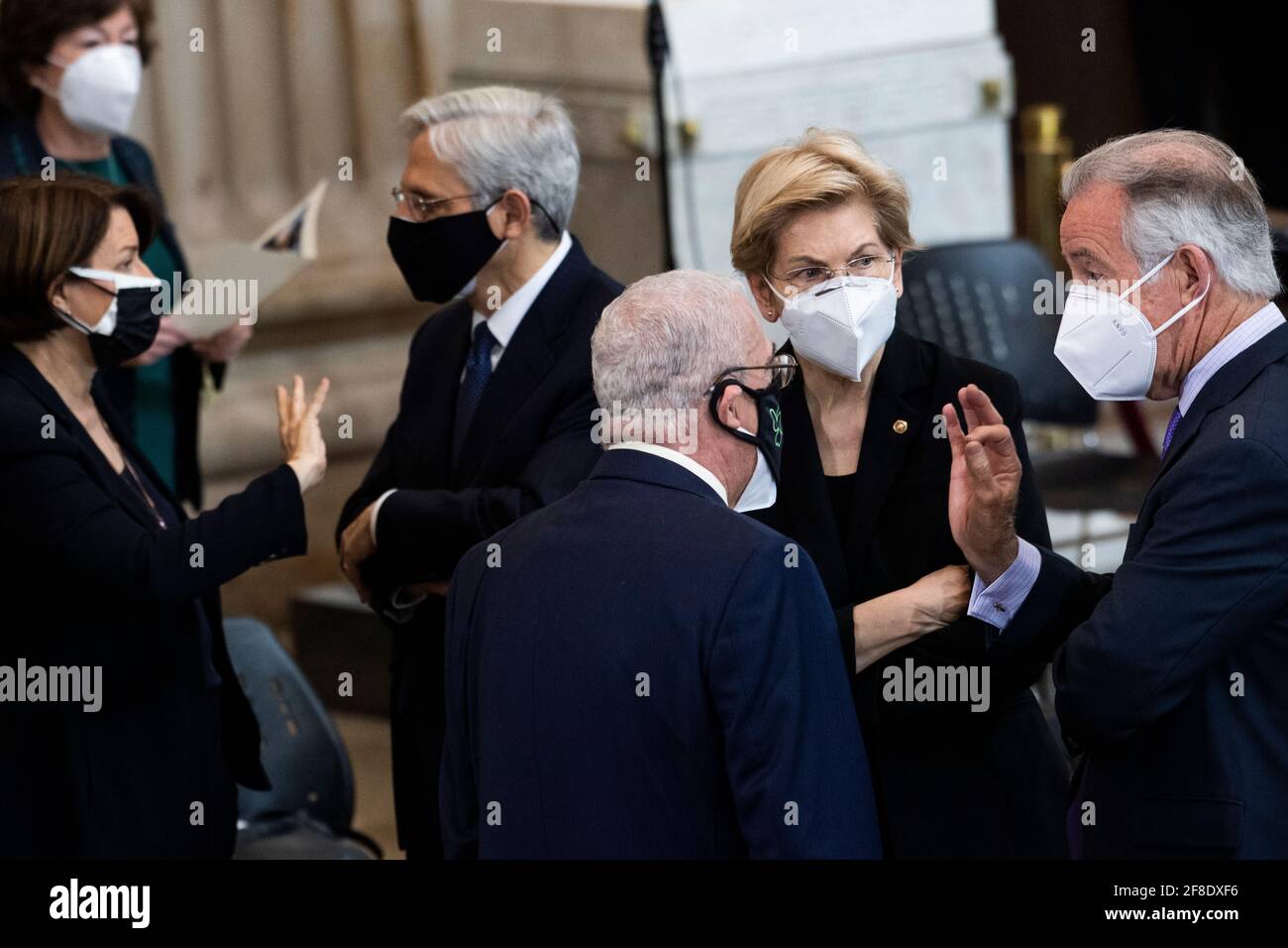 Washington, USA. 13th Apr, 2021. UNITED STATES - APRIL 13: From right, Rep. Richard Neal, D-Mass., Sen. Elizabeth Warren, D-Mass., Rep. Gerry Connolly, D-Va., Attorney General Merrick Garland, Sen. Amy Klobuchar, D-Minn., and Sen. Susan Collins, R-Maine, attend the service for U.S. Capitol Officer William “Billy” Evans, before his remains lie in honor in the Capitol Rotunda in Washington, DC, on Tuesday, April 13, 2021. Evans was killed when a driver rammed the north barricade of the Capitol on April 2, 2021. (Photo By Tom Williams/Pool/Sipa USA) Credit: Sipa USA/Alamy Live News Stock Photo