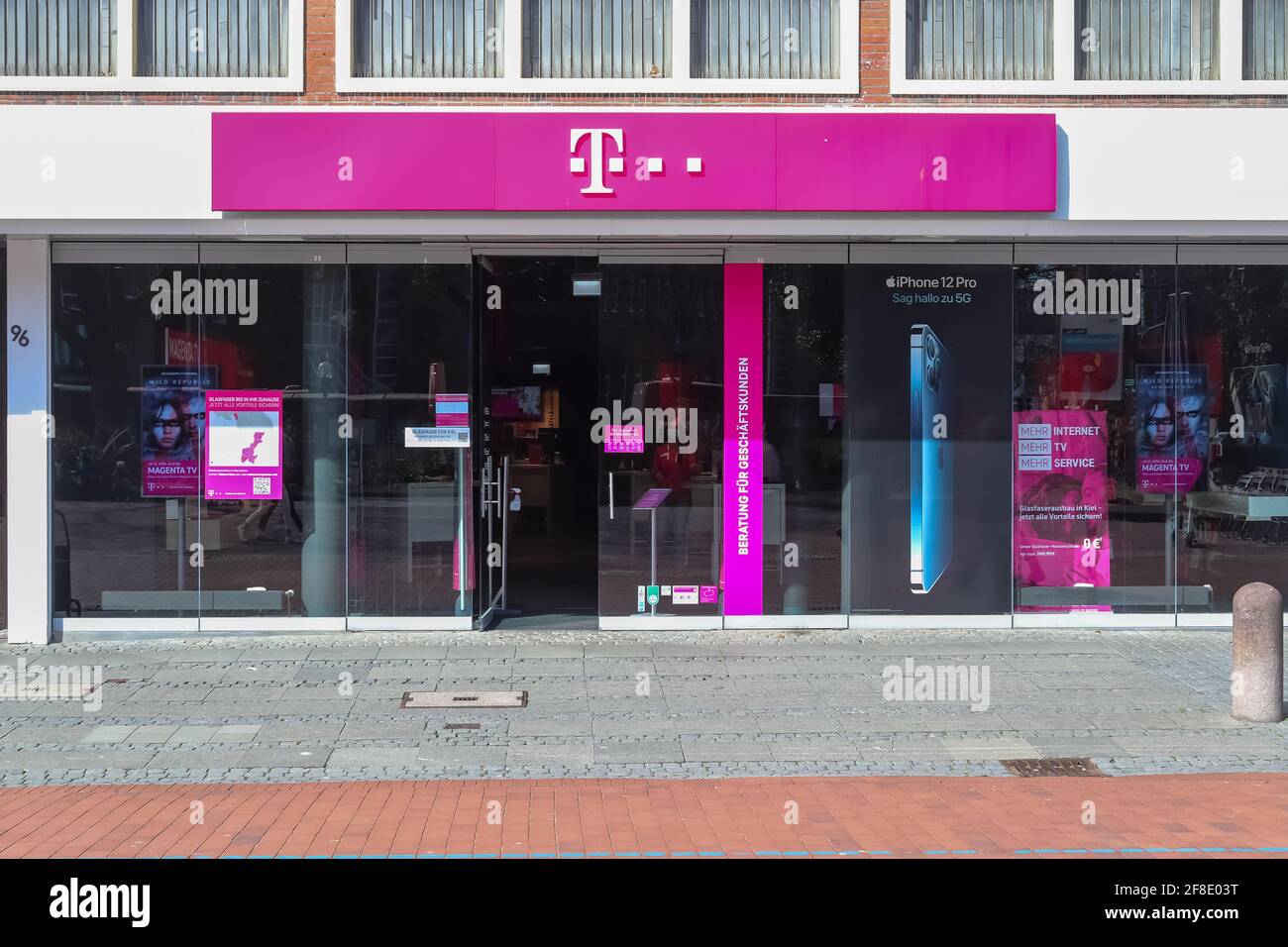 Entrance of a Telekom Store in the city of Kiel in Germany Stock Photo