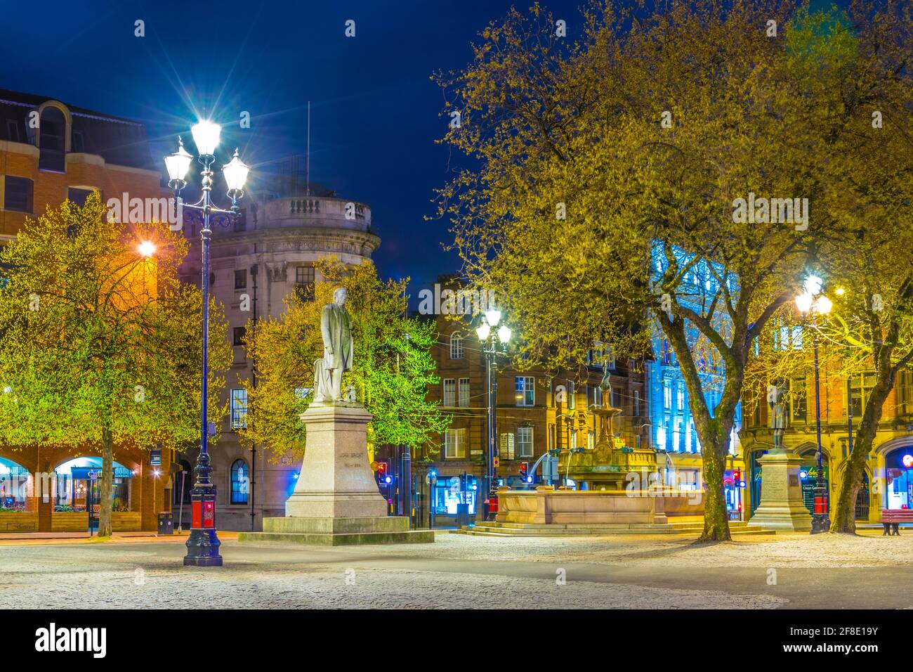 MANCHESTER, UNITED KINGDOM, APRIL 11, 2017: Night view of the Statue of John Bright on Albert square in front of the town hall in Manchester, England Stock Photo
