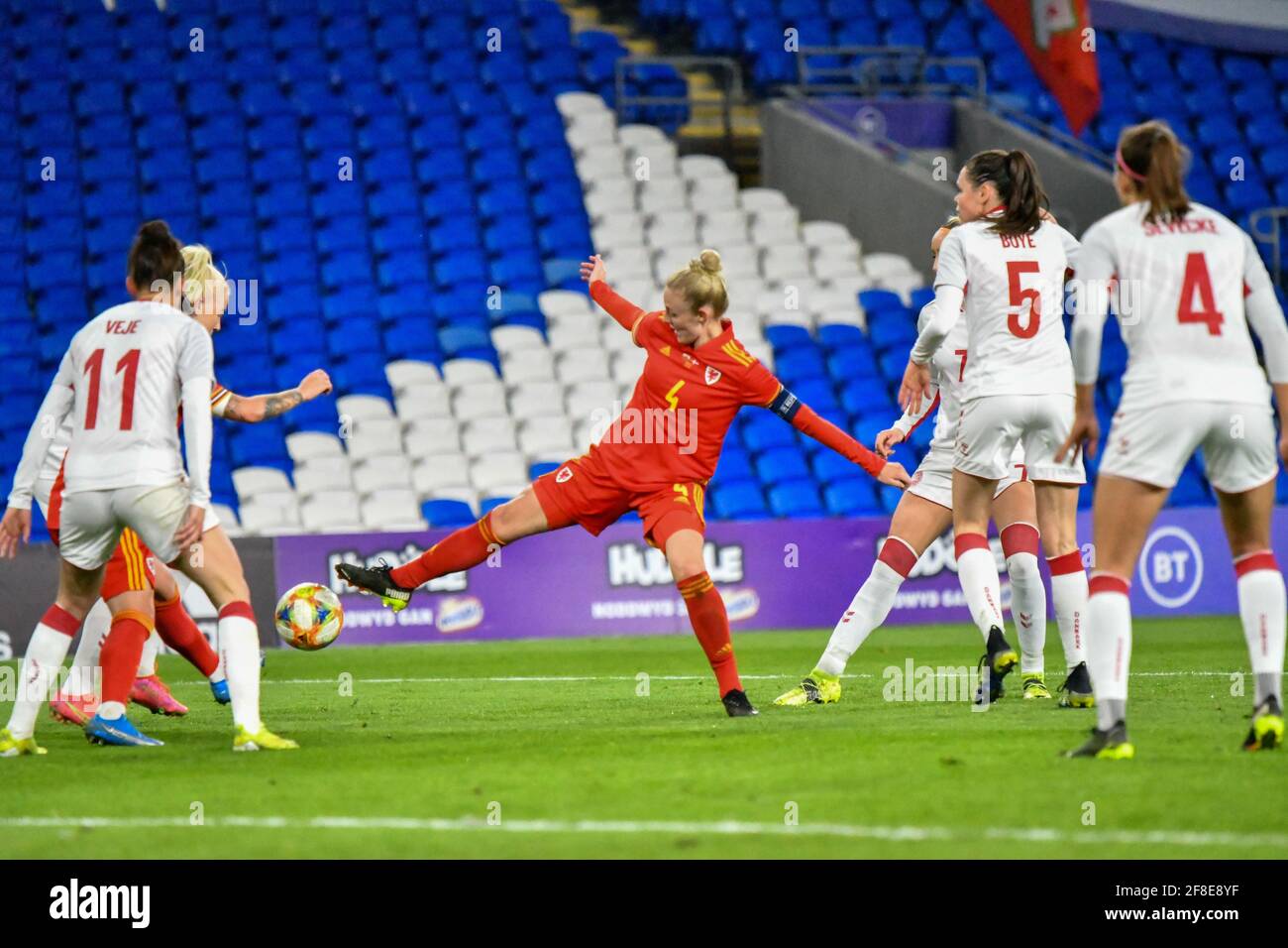 Cardiff, Wales. 13 April, 2021. Sophie Ingle of Wales Women challenges for the ball during the Women's International Friendly match between Wales and Denmark at the Cardiff City Stadium in Cardiff, Wales, UK on 13, April 2021. Credit: Duncan Thomas/Majestic Media/Alamy Live News. Stock Photo