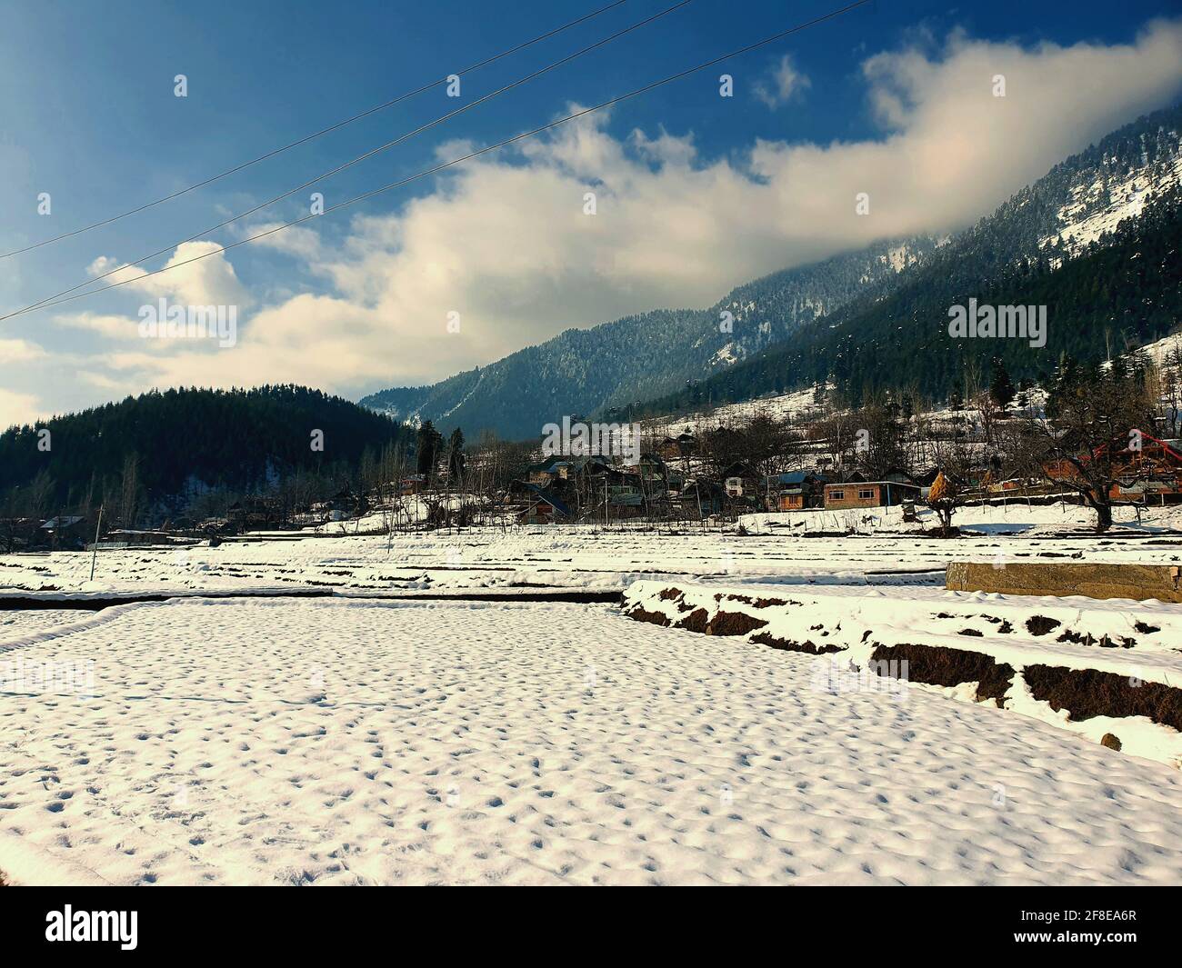 Snowcapped peaks, clear blue skies, barren mountains with meandering rivers, Kashmir is picturesque. Scenic Beauty. Stock Photo