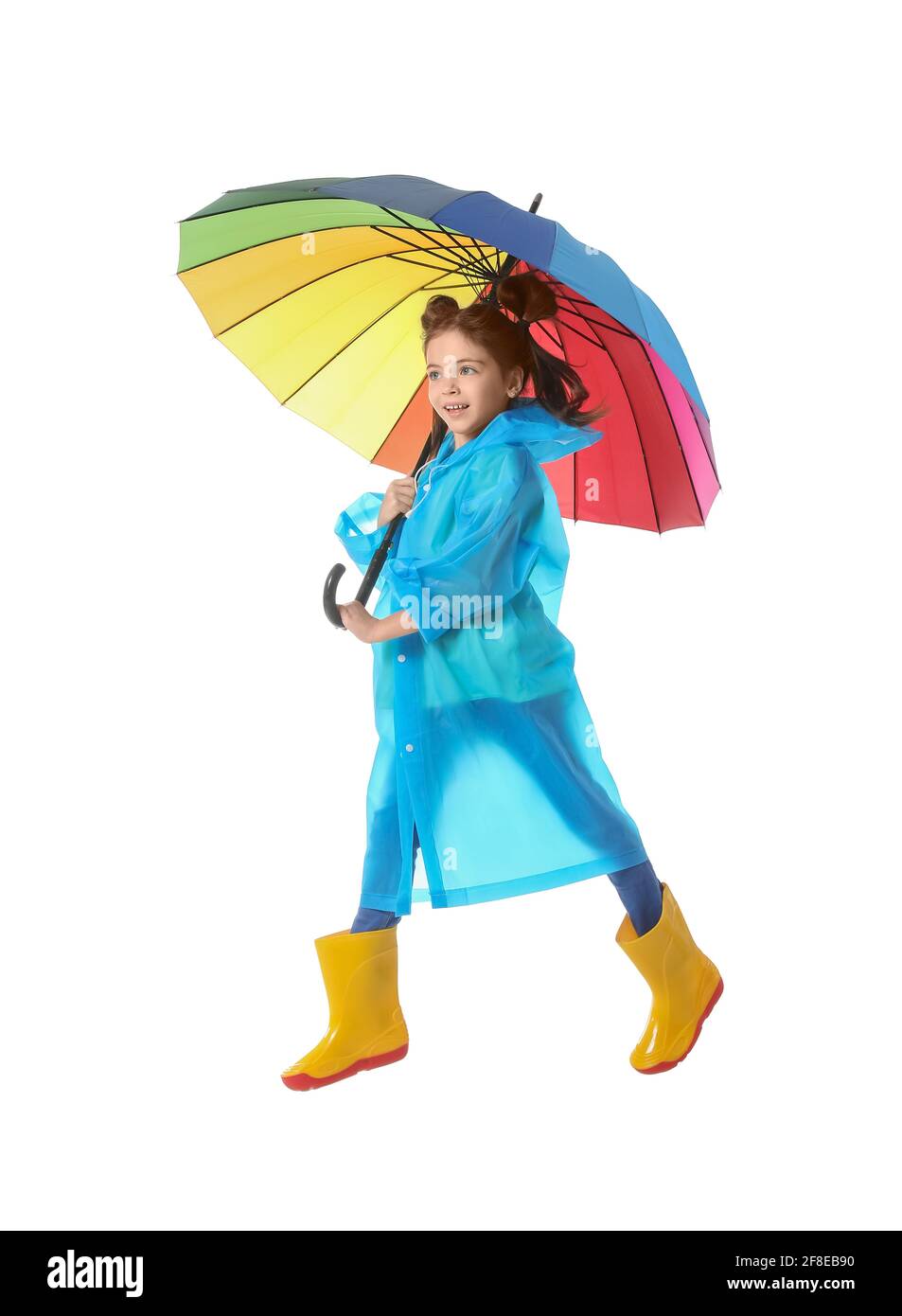 Jumping little girl with umbrella on white background Stock Photo - Alamy