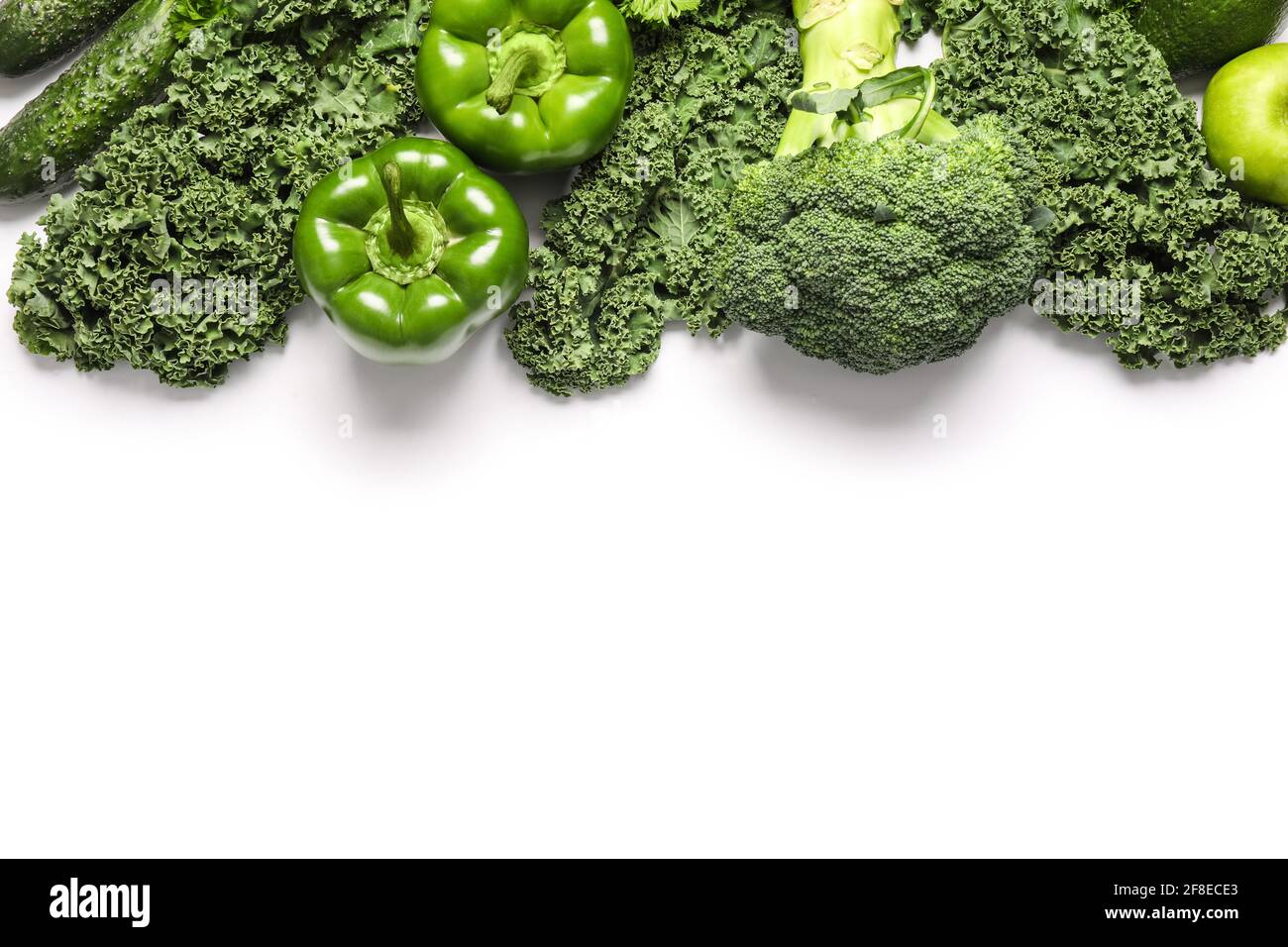 Fresh green vegetables on white background Stock Photo - Alamy