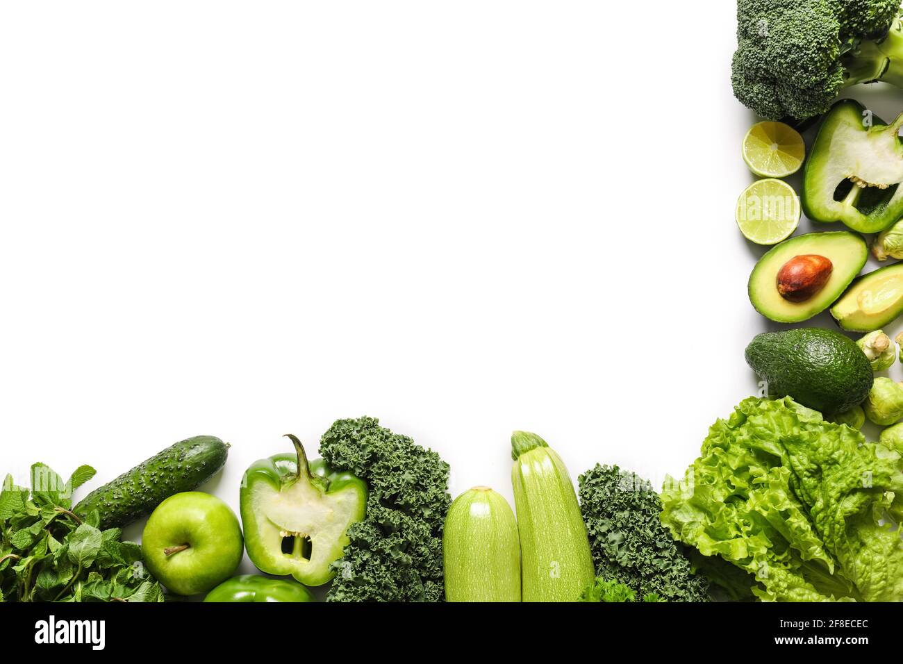 Fresh green vegetables on white background Stock Photo - Alamy