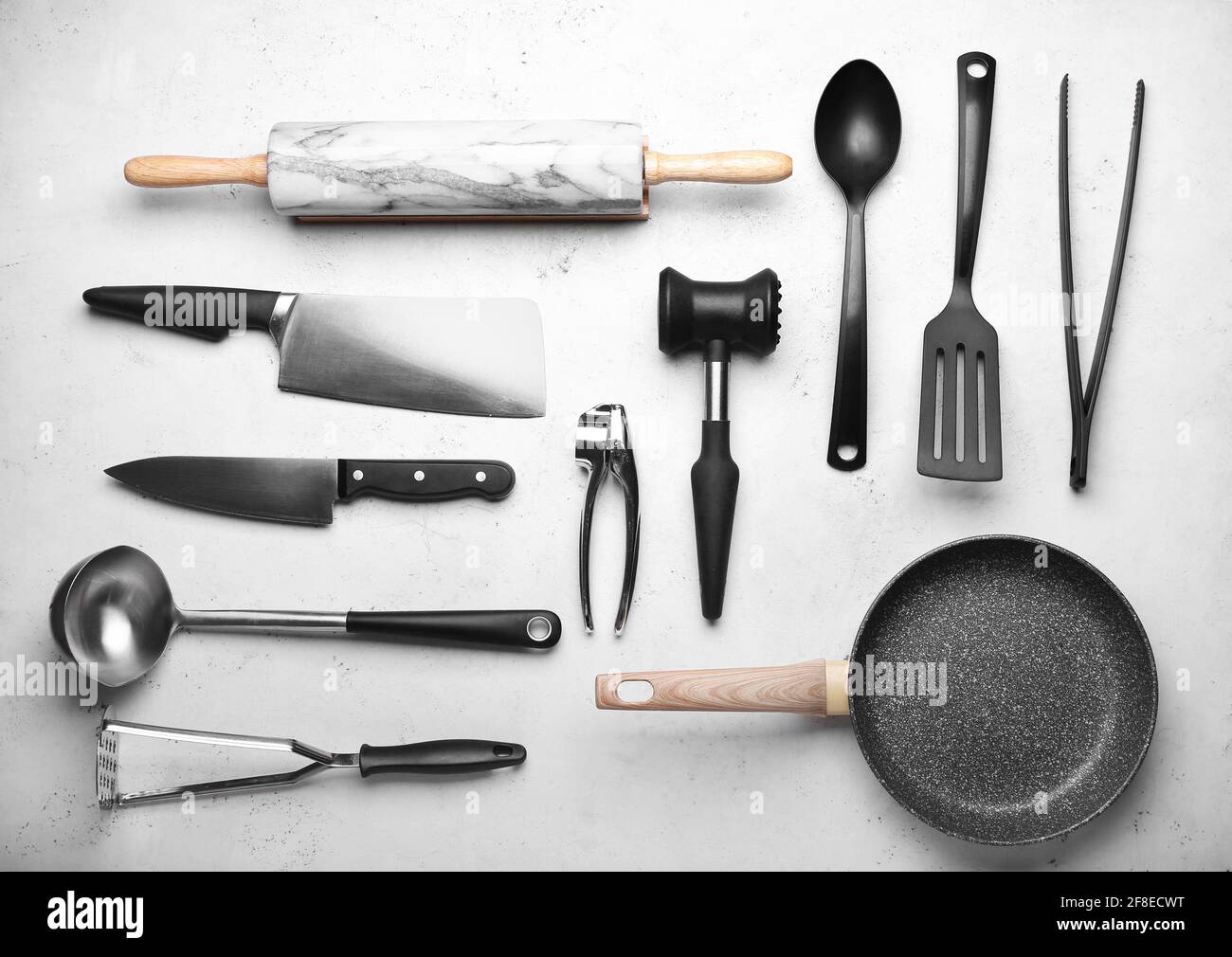 Set of kitchen utensils on light background Stock Photo - Alamy
