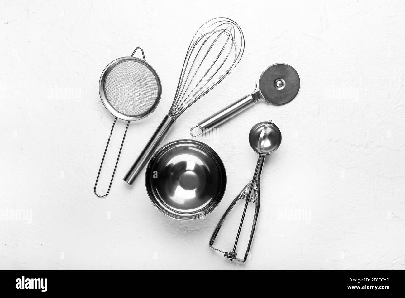 Set of kitchen utensils on light background Stock Photo - Alamy