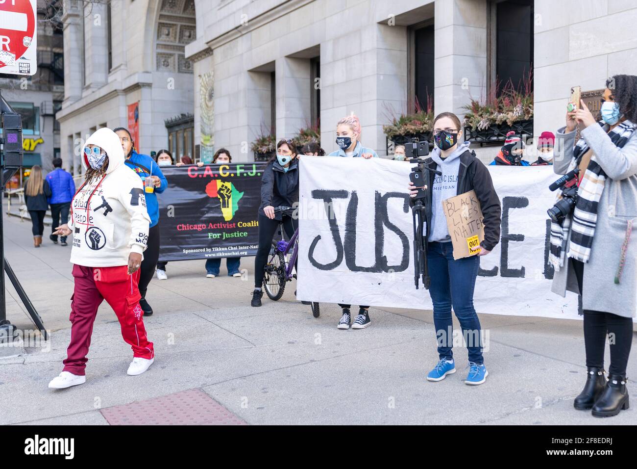 Chicago, Illinois - March 13, 2021: A Group of Peaceful Breonna Taylor Protesters Demand Justice in Downtown Chicago During the COVID-19 Pandemic. Stock Photo