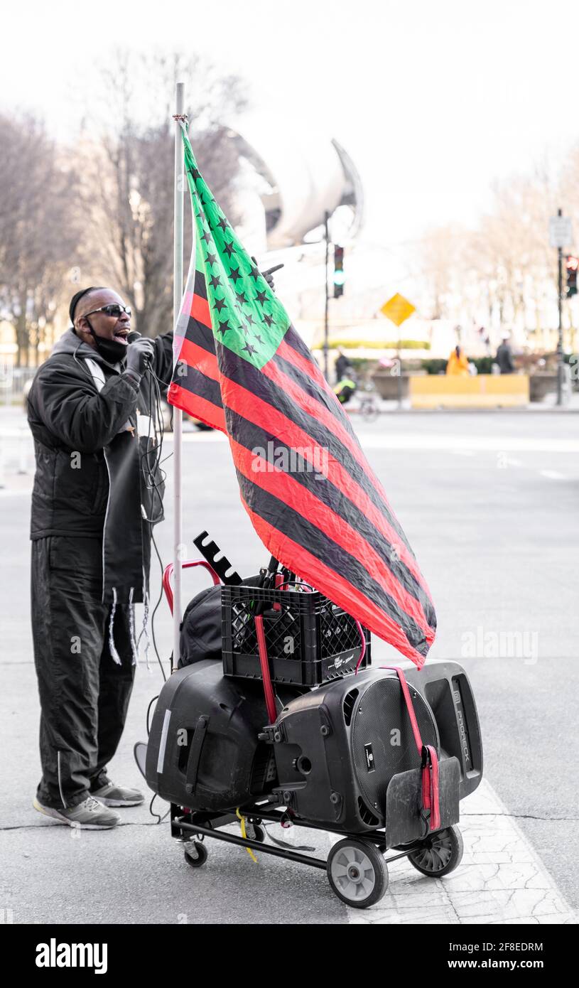 Chicago, Illinois - March 13, 2021: A BLM Protestor Speaks About Breonna Taylor in Downtown Chicago During the COVID-19 Pandemic. Stock Photo