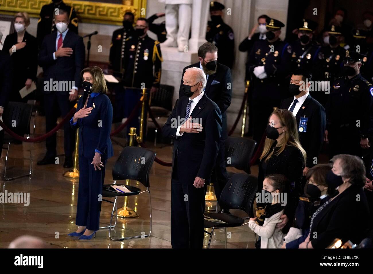 (210414) -- WASHINGTON, April 14, 2021 (Xinhua) -- U.S. President Joe Biden pays his respect to U.S. Capitol Police officer William "Billy" Evans at the Capitol Hill in Washington, DC, April 13, 2021. William "Billy" Evans, the 18-year Capitol Police officer killed while in the line of duty when a car rammed into him and another officer, lay in honor in the Capitol Rotunda on Tuesday. (Amr Alfiky/Pool via Xinhua) Stock Photo