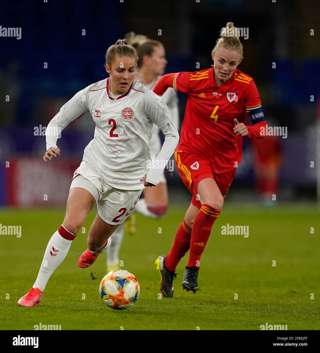 Cardiff, UK. 13th Apr, 2021. Olivia Holdt (L) and Sophie Ingle are seen in action during the Womens Friendly match between Wales and Denmark at Cardiff City Stadium.Final score; Wales 1:1 Denmark) Credit: SOPA Images Limited/Alamy Live News Stock Photo
