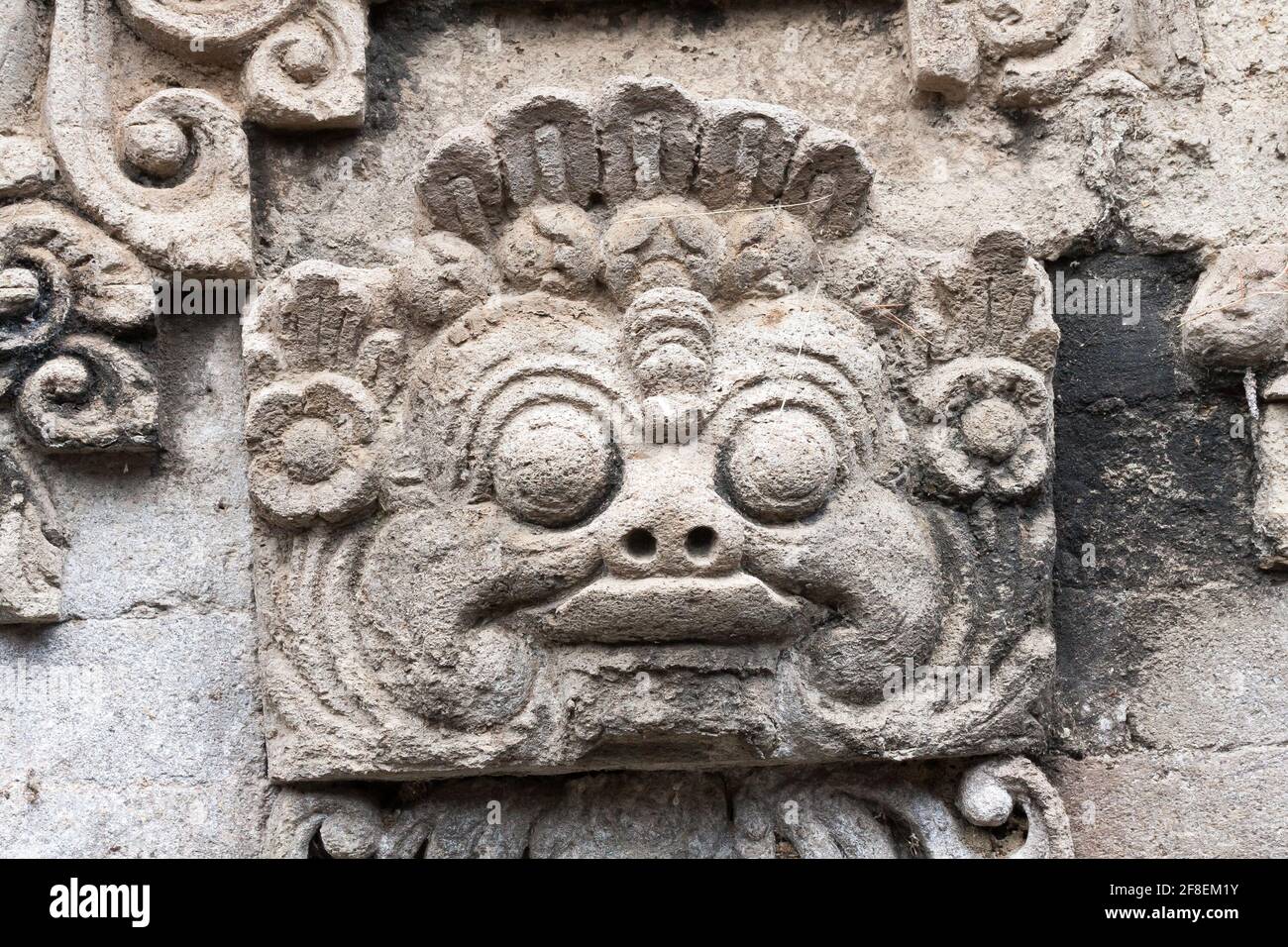 Stone carving outside a Balinese Hindu village temple, Bali, Indonesia Stock Photo