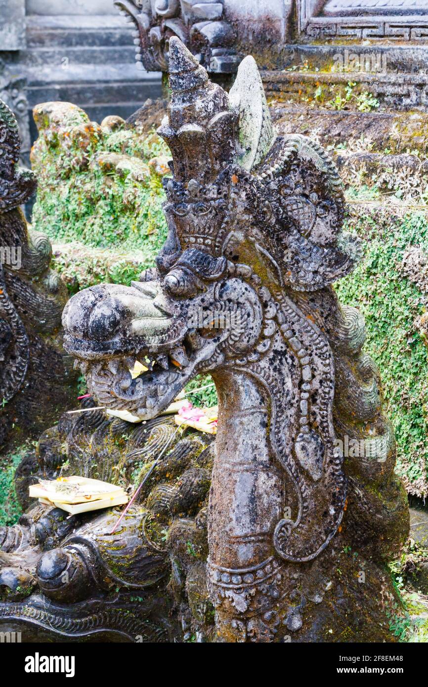 Stone statue outside a Balinese Hindu village temple, Bali, Indonesia Stock Photo