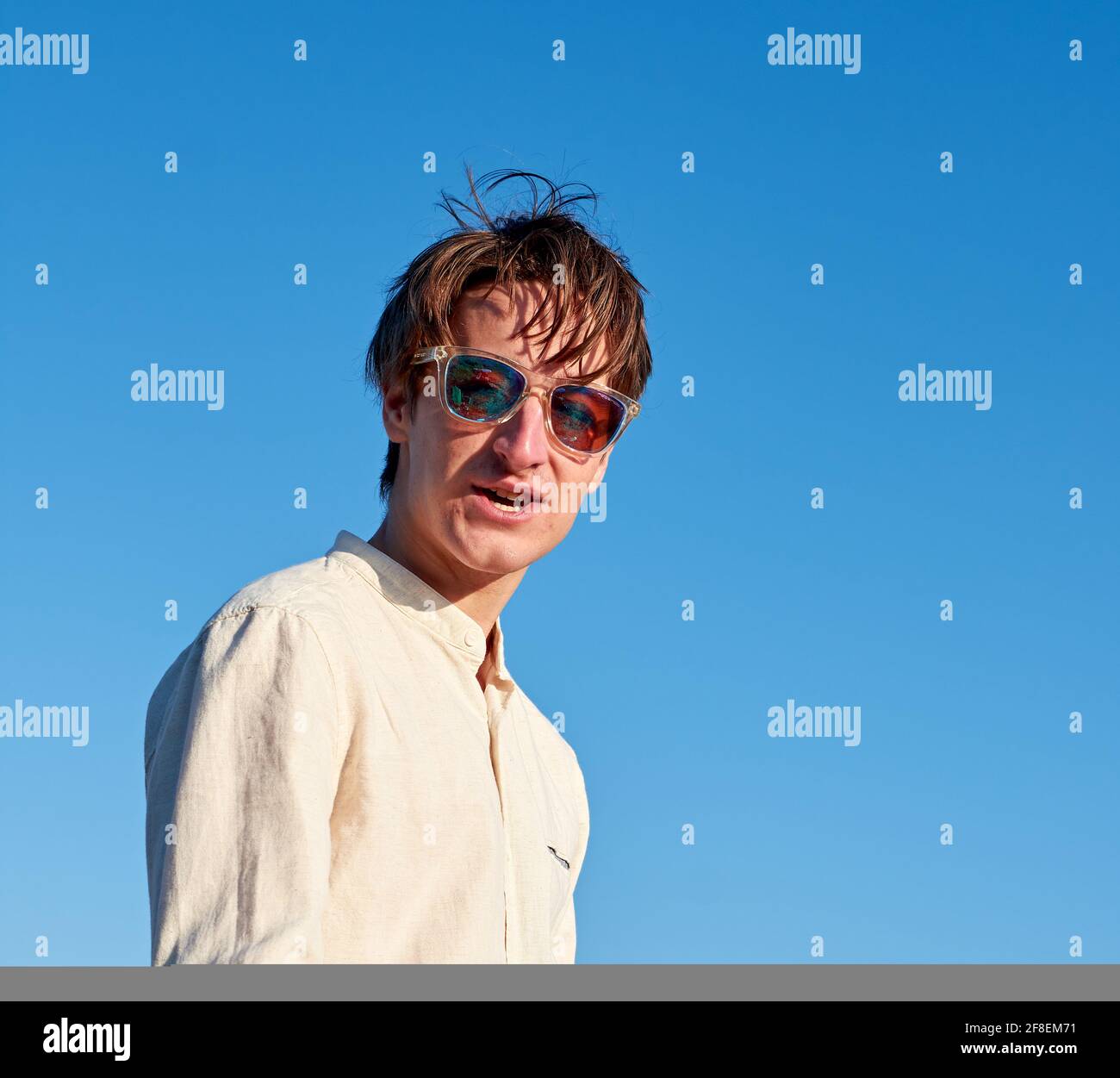 Man in glasses blue shirt hi-res stock photography and images - Alamy