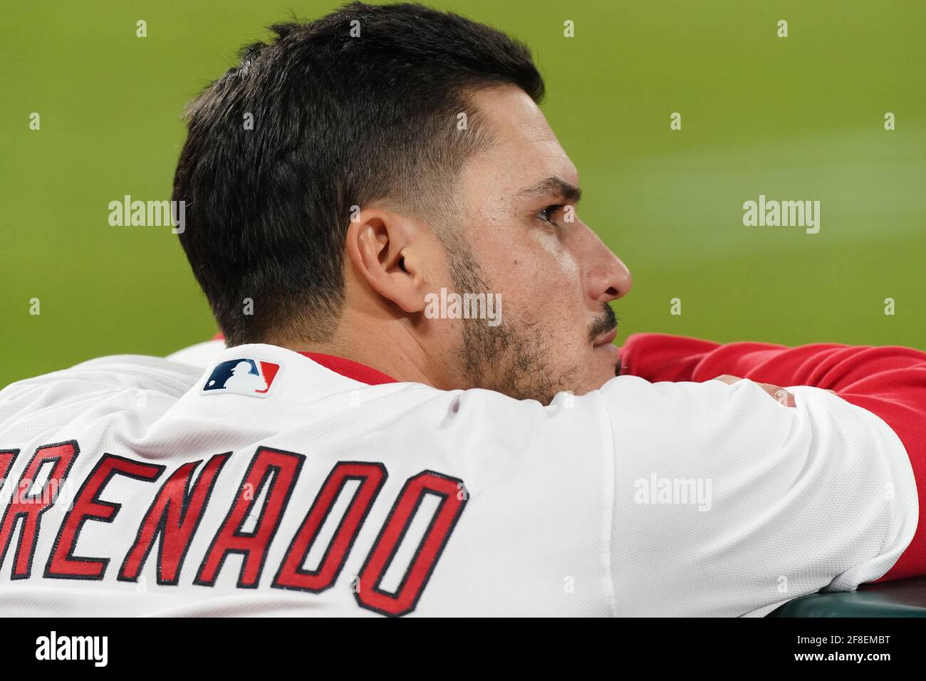 St. Louis, United States. 13th Apr, 2021. St. Louis Cardinals Nolan Arenado  watches the action against the Washington Nationals, from the dugout in the  third inning at Busch Stadium in St. Louis