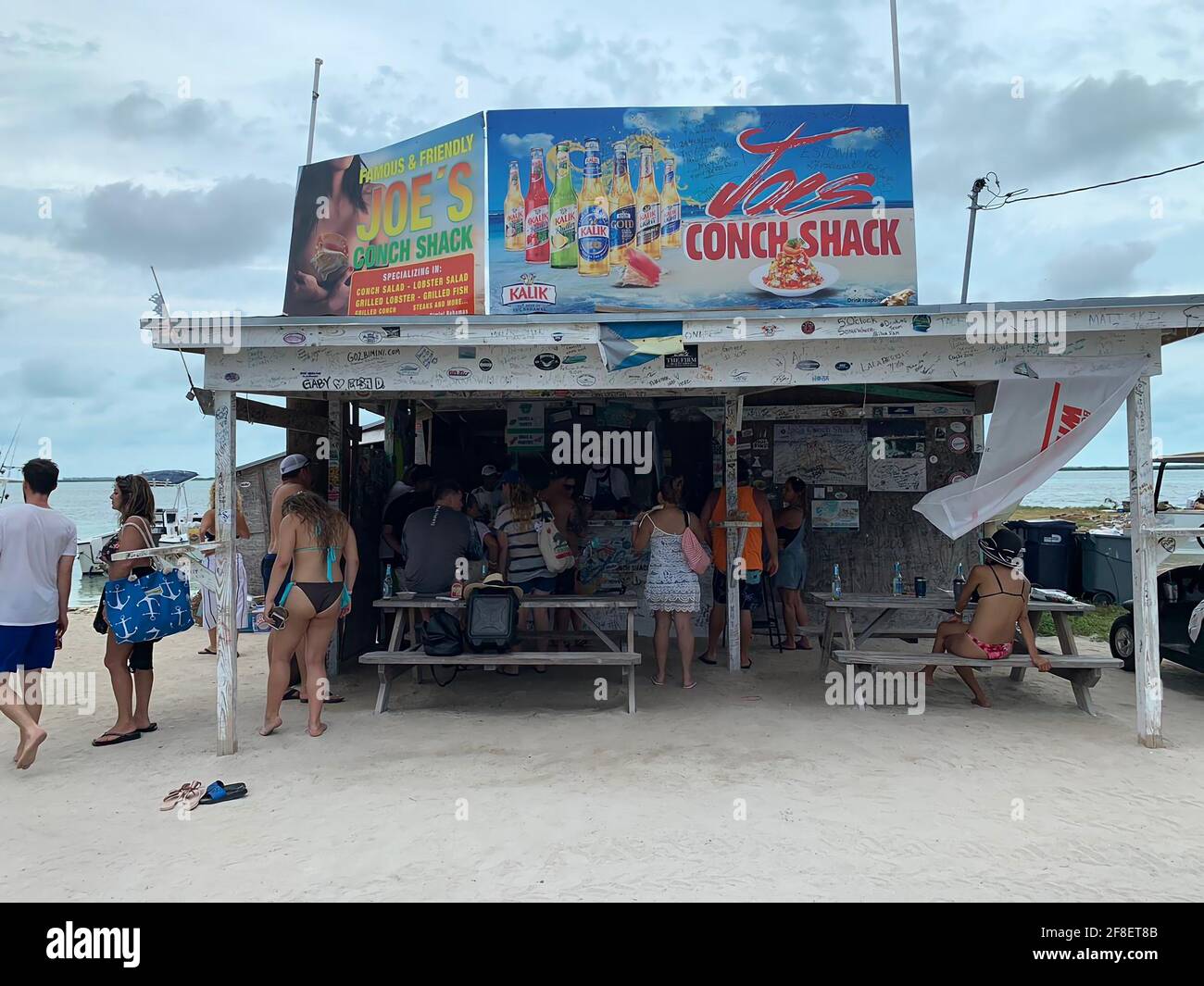 Joe's Conch Shack is a must stop when in Bimini. Remember to be on 'island time.' Grab yourself a beer, wait for the conch fritters Stock Photo