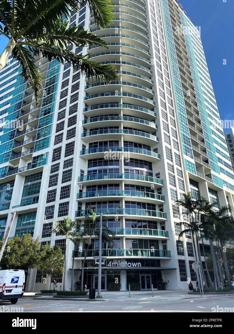 Large upscale building in downtown Miami, Florida called MIDTOWN 4. Hosting residential apartments as well as urban, fresh, and local businesses. Stock Photo