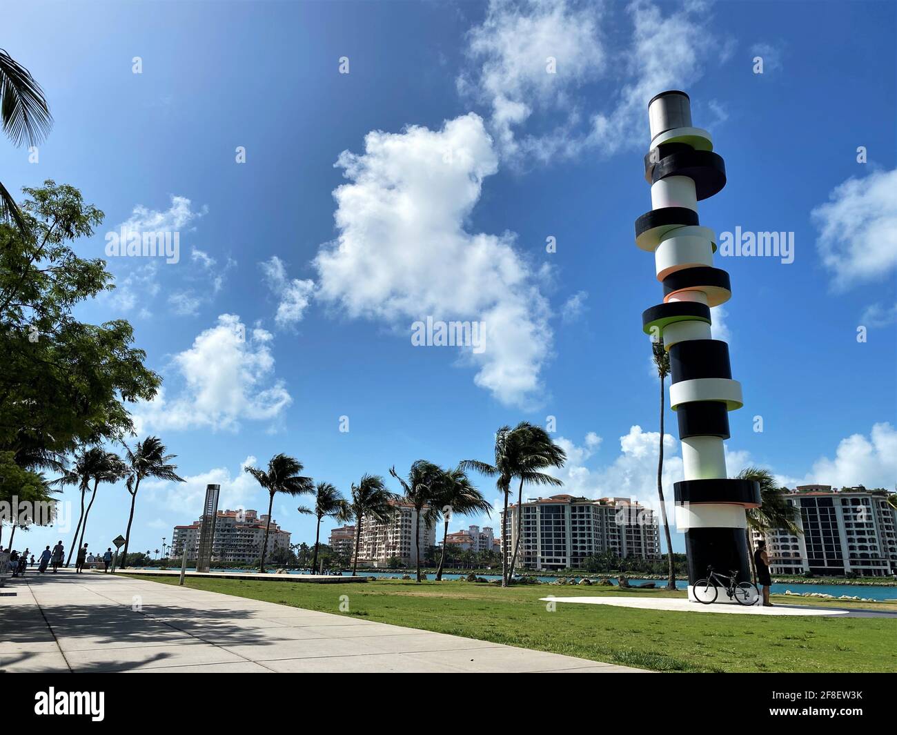 Lighthouse Sculpture in South Pointe Park Miami Beach, Florida by artist Tobias Rehberger. Tourists and locals enjoying the view. Stock Photo