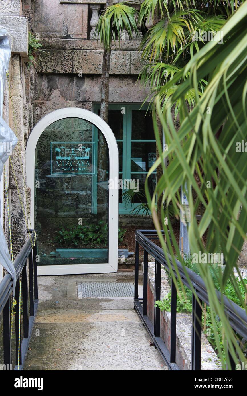 Open glass door to the Vizcaya cafe and shop at The Vizcaya Museum and Garden. Stock Photo