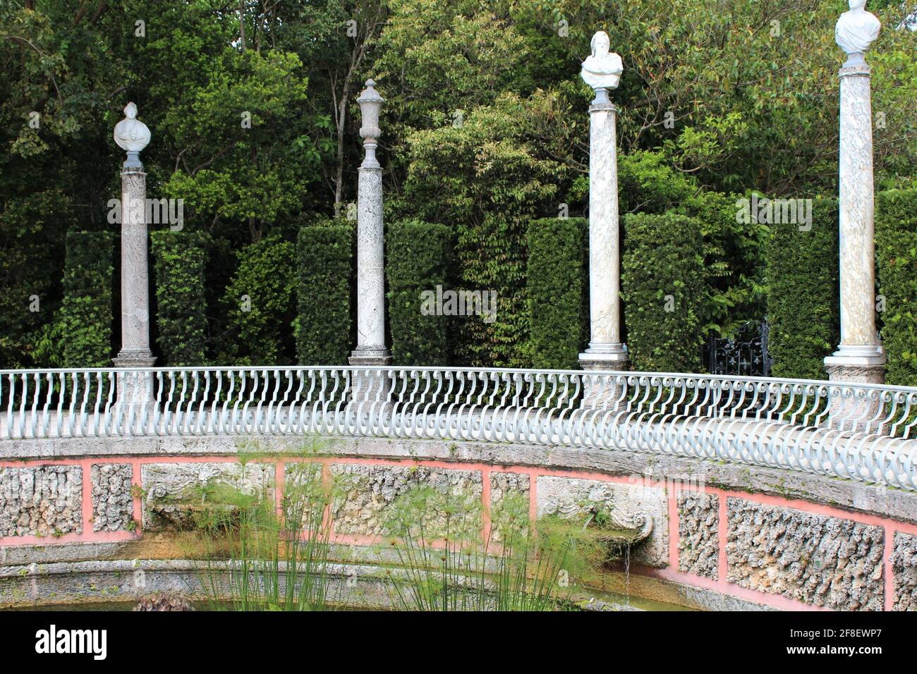 Pillars at the outdoor garden with sculpture busts at The Vizcaya Museum and Garden. Stock Photo