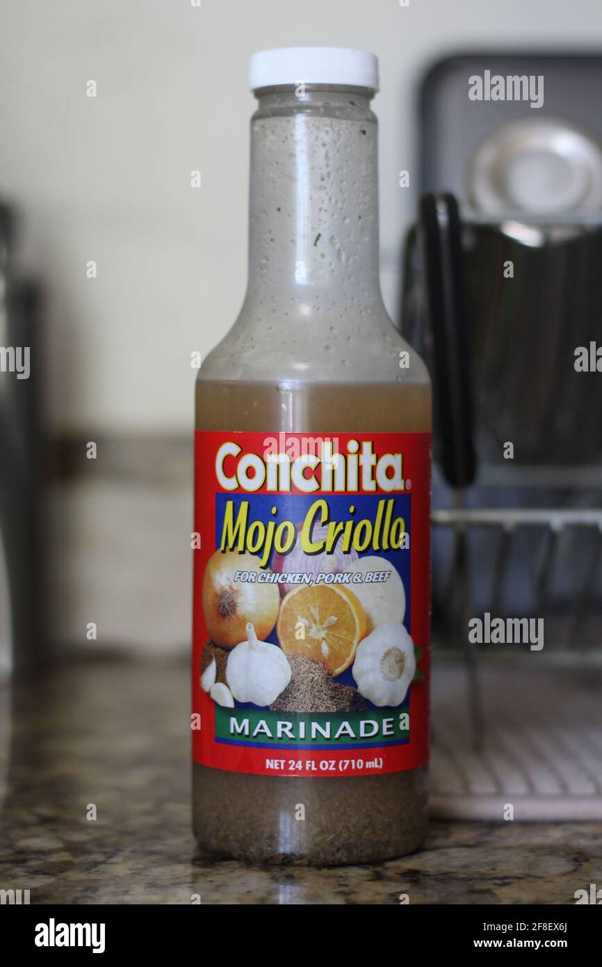 Bottle of Conchita' Mojo Criollo which is used for cooking in a Hispanic family. Conchita's Mojo marinade can be used with meat poultry fish & chicken Stock Photo