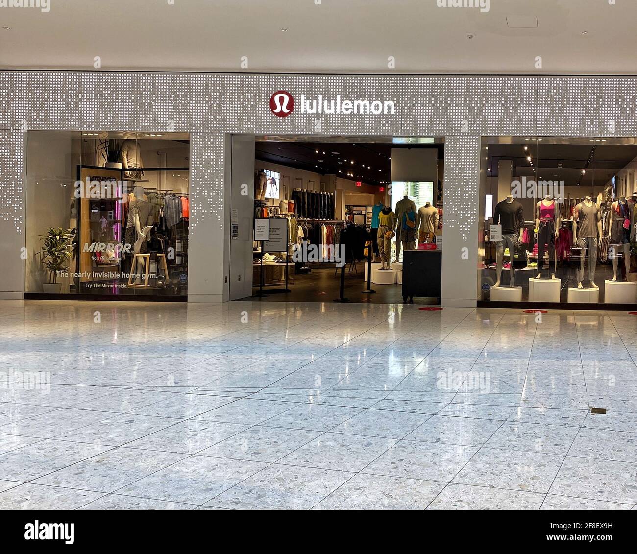 Lululemon Athletica workout clothing boutique storefront inside Aventura mall in south Florida Technical athletic clothes for yoga running working out Stock Photo